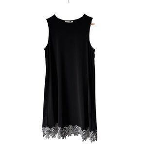 Elegant Black Sleeveless Dress with White Lace Hem, Medium